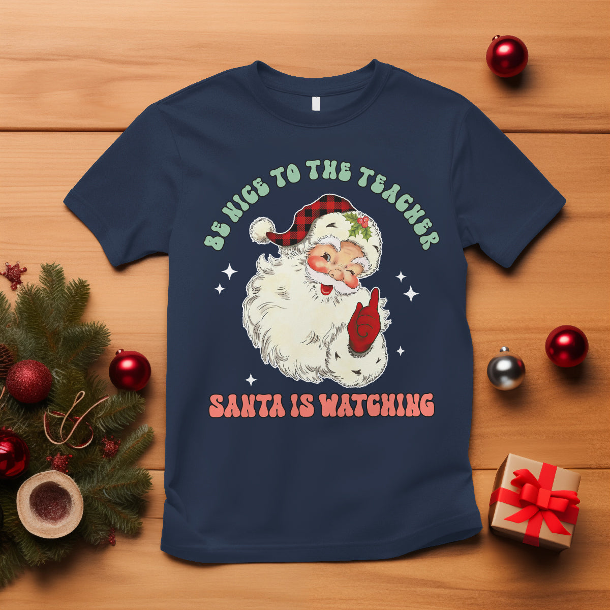 be-nice-to-the-teacher-santa-is-watching-retro-groovy-christmas-t-shirt