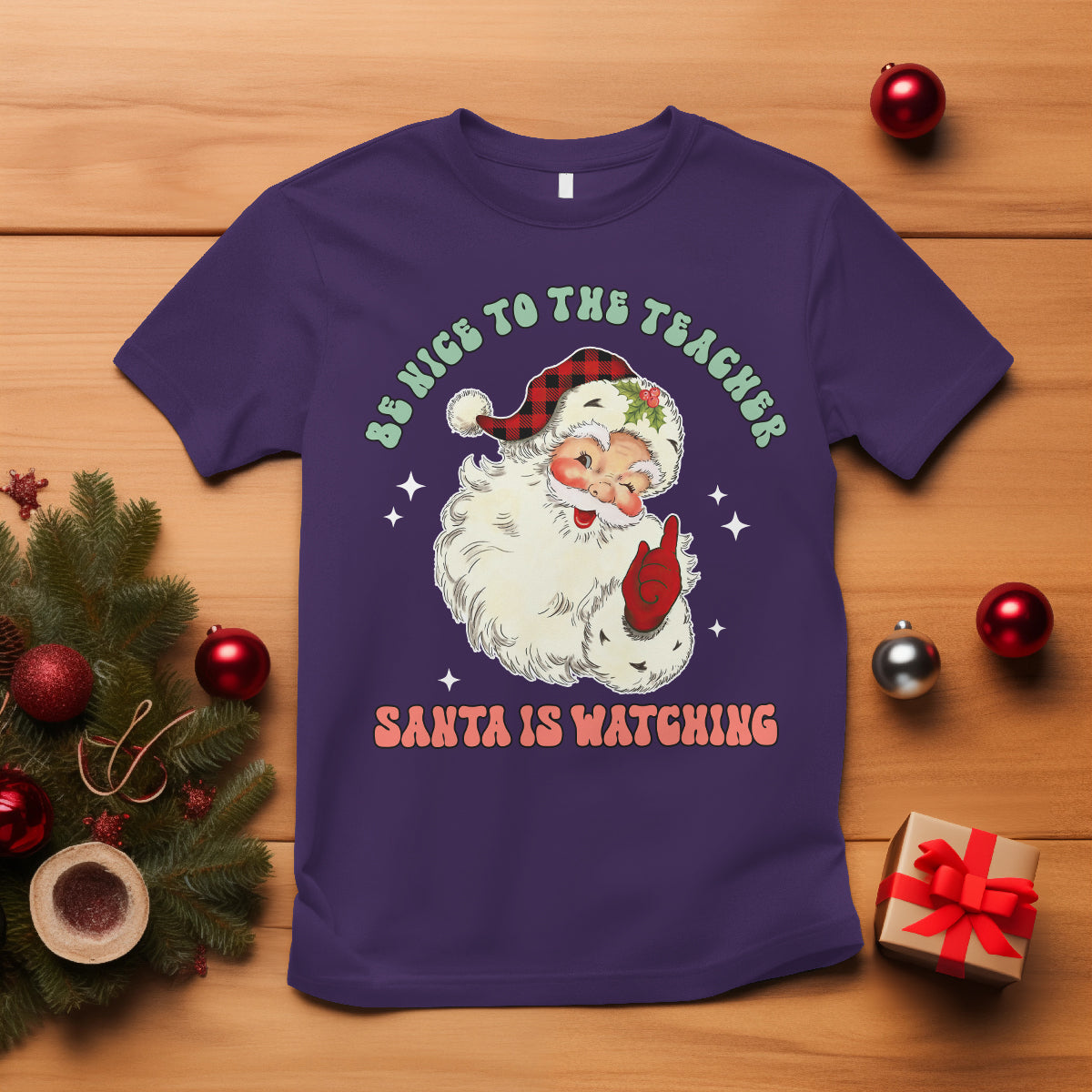 be-nice-to-the-teacher-santa-is-watching-retro-groovy-christmas-t-shirt