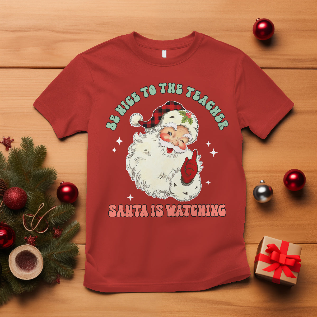 be-nice-to-the-teacher-santa-is-watching-retro-groovy-christmas-t-shirt