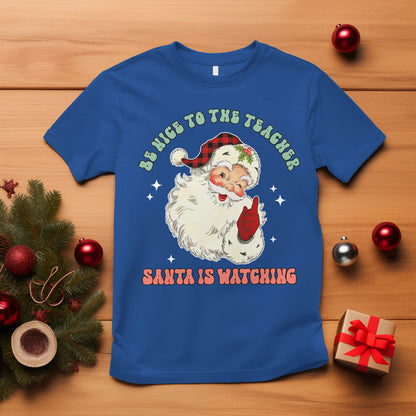 be-nice-to-the-teacher-santa-is-watching-retro-groovy-christmas-t-shirt