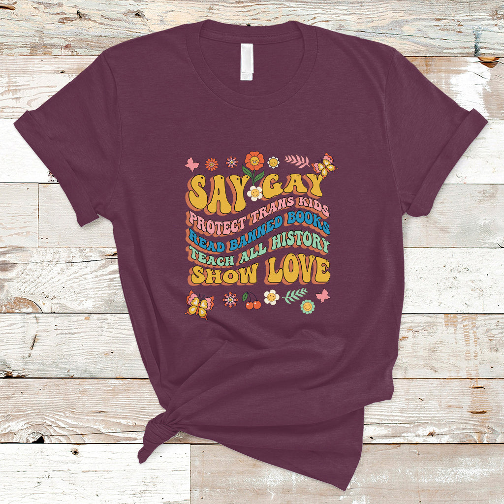 retro-groovy-t-shirt-say-gay-protect-trans-kids-read-banned-books-lgbt-groovy