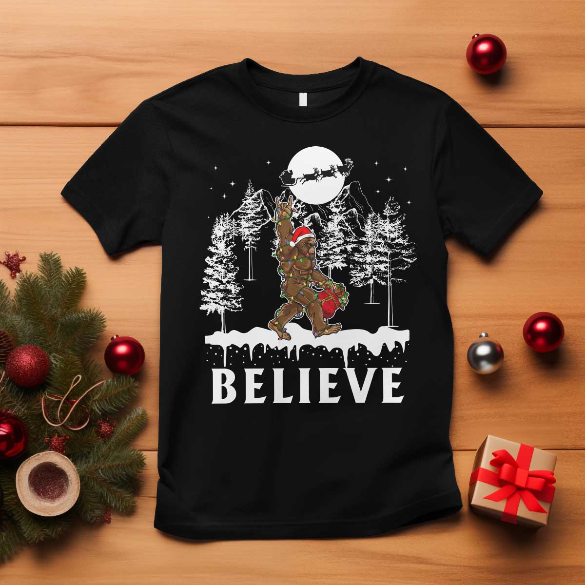 bigfoot-christmas-tree-lights-t-shirt-believe-rock-on-sasquatch-santa-hat
