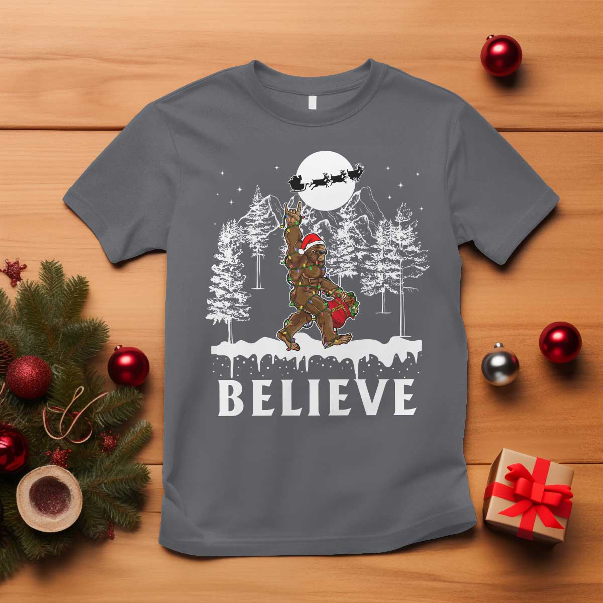 bigfoot-christmas-tree-lights-t-shirt-believe-rock-on-sasquatch-santa-hat