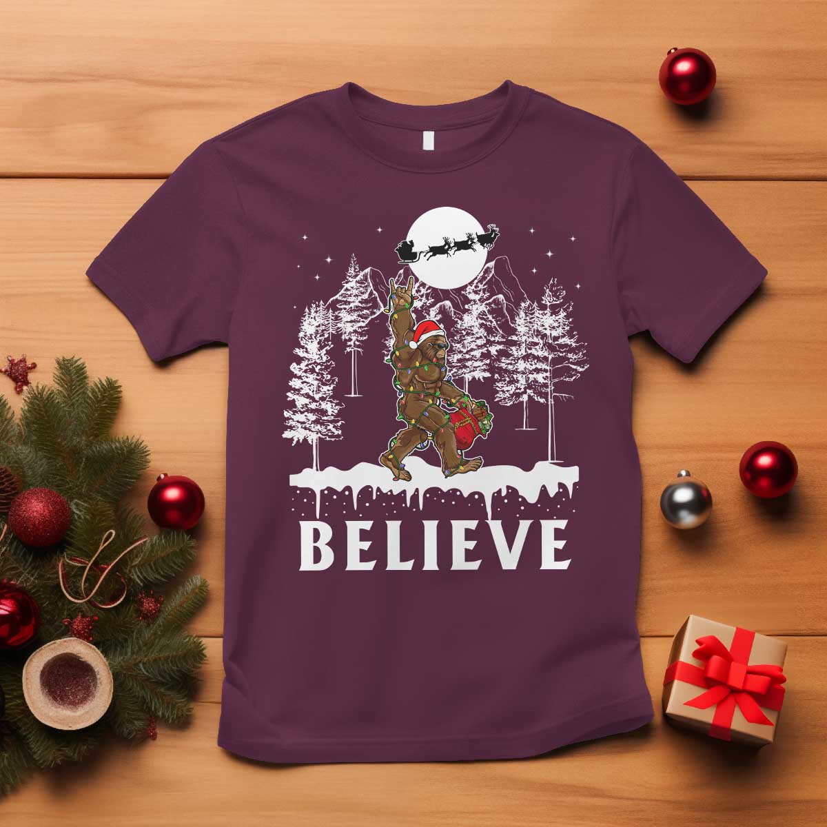 bigfoot-christmas-tree-lights-t-shirt-believe-rock-on-sasquatch-santa-hat