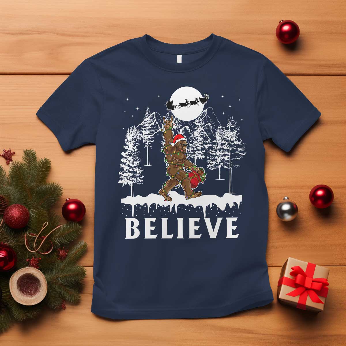 bigfoot-christmas-tree-lights-t-shirt-believe-rock-on-sasquatch-santa-hat