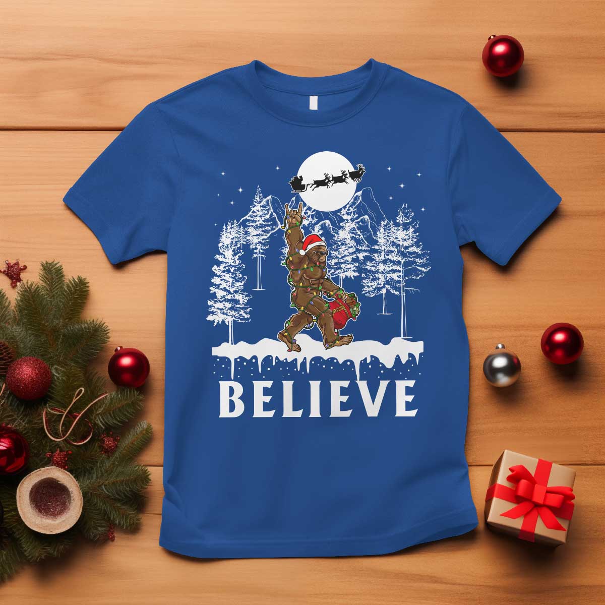 bigfoot-christmas-tree-lights-t-shirt-believe-rock-on-sasquatch-santa-hat