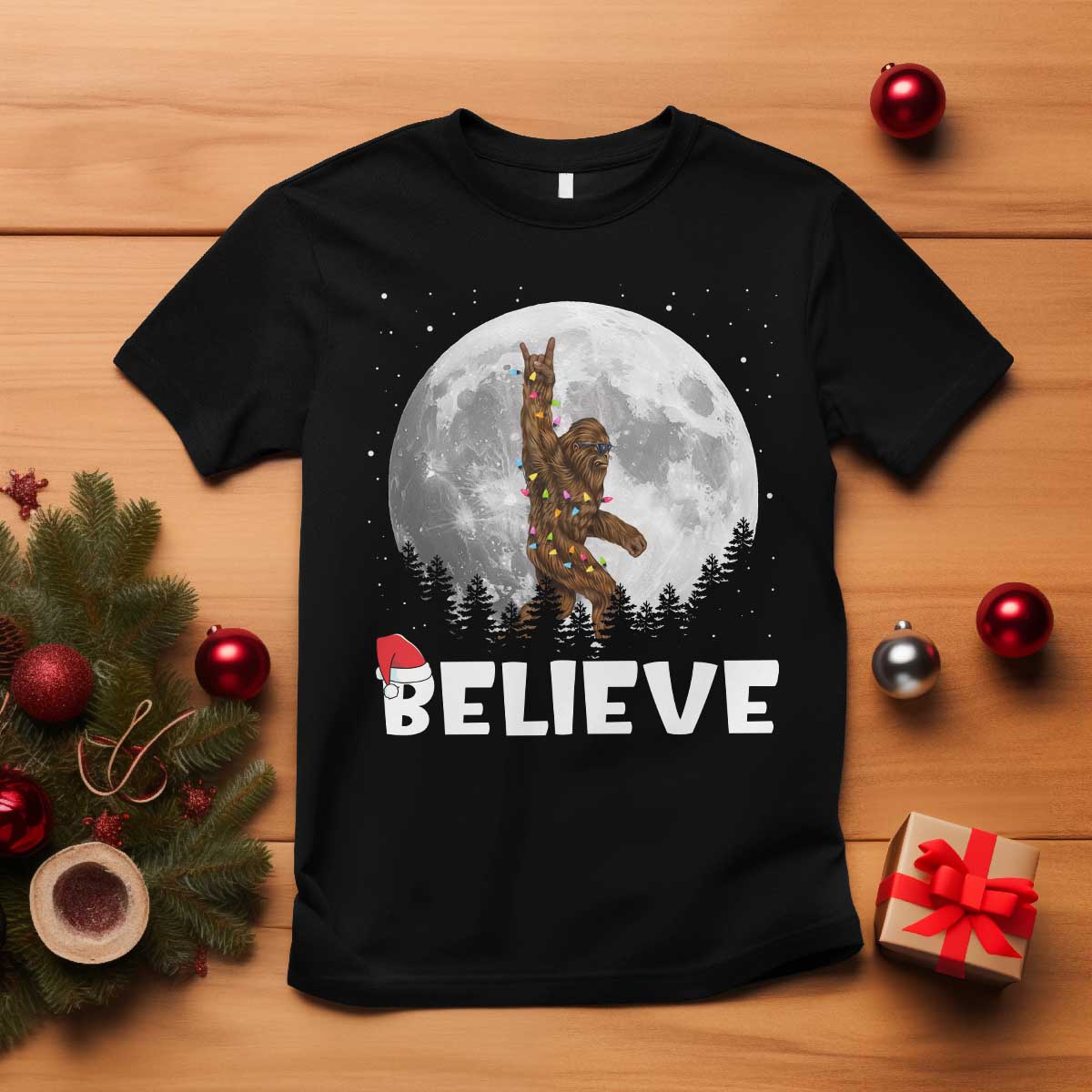 funny-bigfoot-christmas-t-shirt-cool-full-moon-trees-sasquatch-xmas-lights