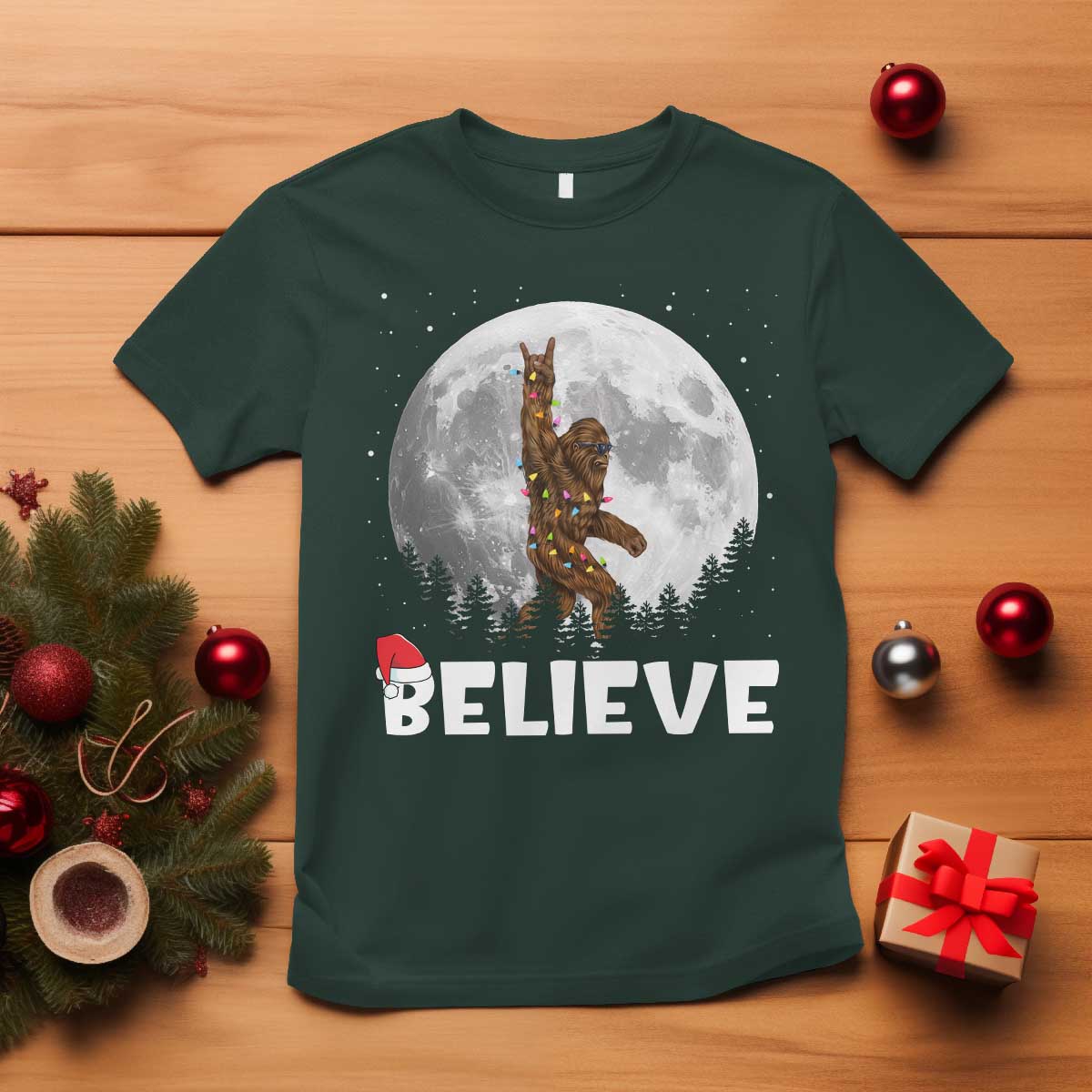 funny-bigfoot-christmas-t-shirt-cool-full-moon-trees-sasquatch-xmas-lights