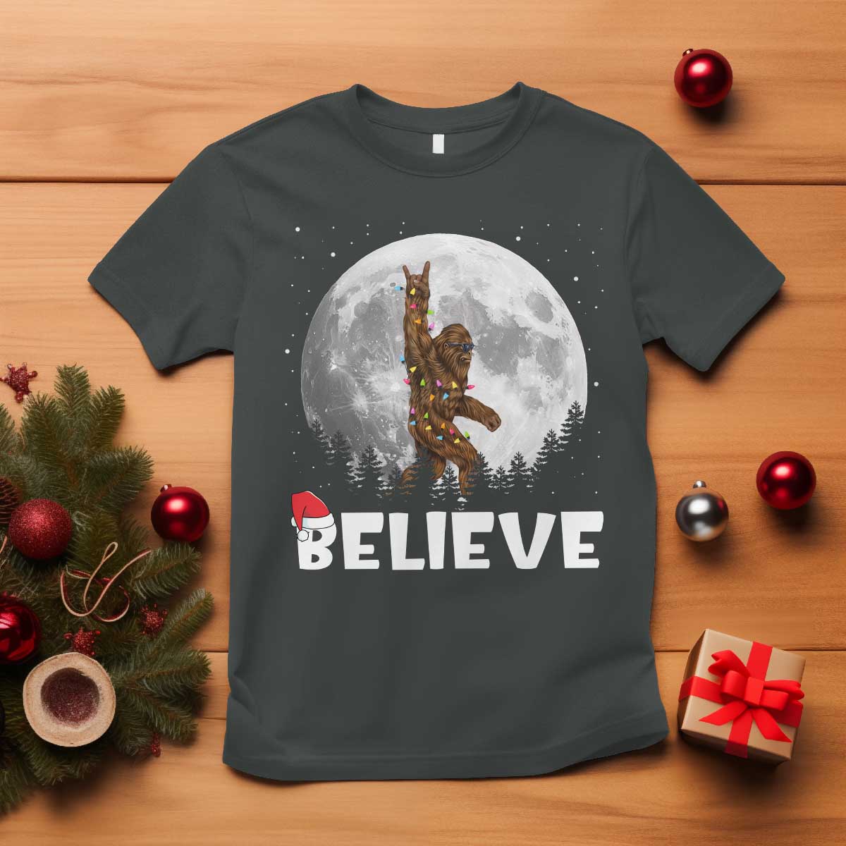 funny-bigfoot-christmas-t-shirt-cool-full-moon-trees-sasquatch-xmas-lights