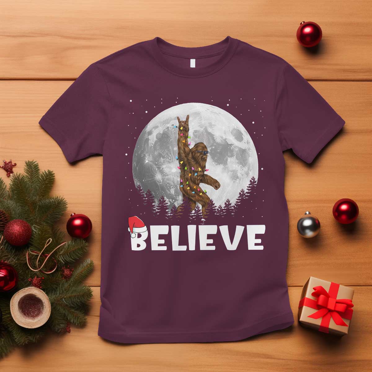 funny-bigfoot-christmas-t-shirt-cool-full-moon-trees-sasquatch-xmas-lights