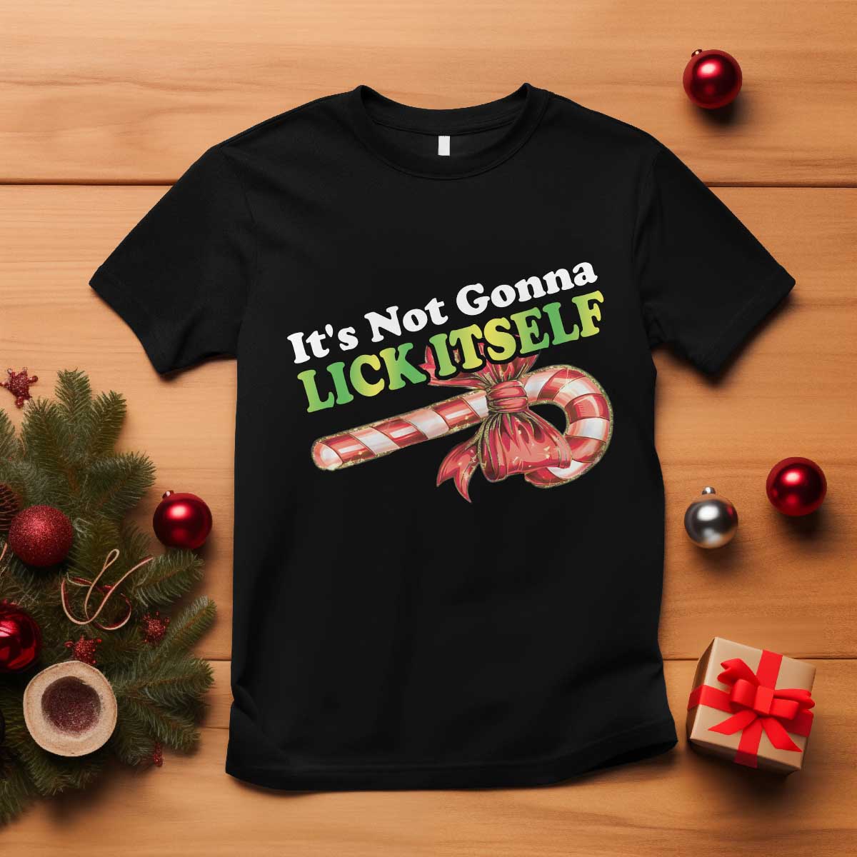funny-christmas-candy-cane-t-shirt-its-not-gonna-lick-itself