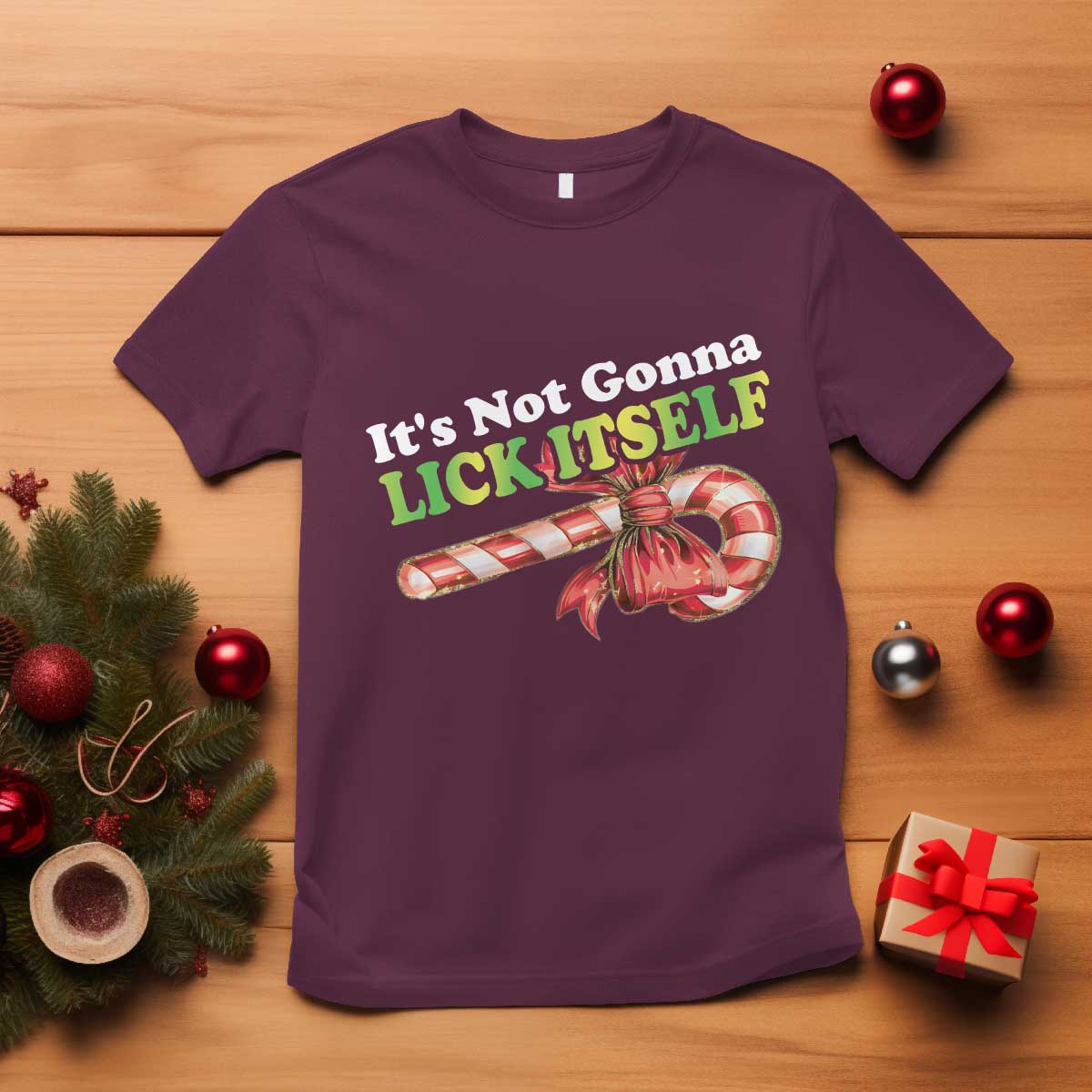 funny-christmas-candy-cane-t-shirt-its-not-gonna-lick-itself
