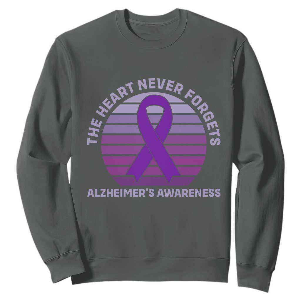 The Heart Never Forgets Alzheimers Support Sweatshirt Vintage Sunset Purple Ribbon Graphic