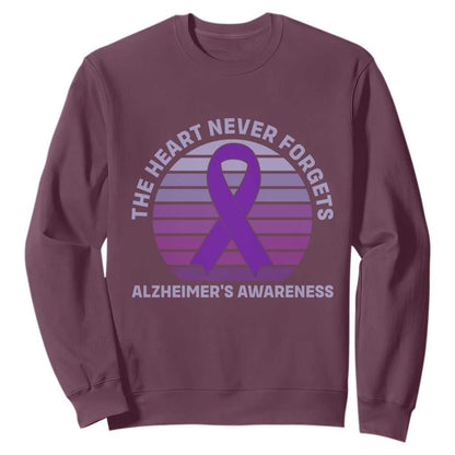 The Heart Never Forgets Alzheimers Support Sweatshirt Vintage Sunset Purple Ribbon Graphic