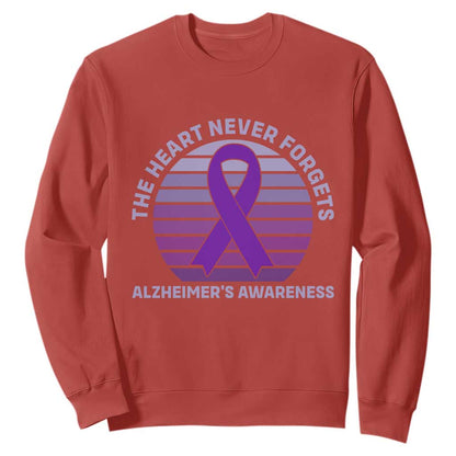The Heart Never Forgets Alzheimers Support Sweatshirt Vintage Sunset Purple Ribbon Graphic