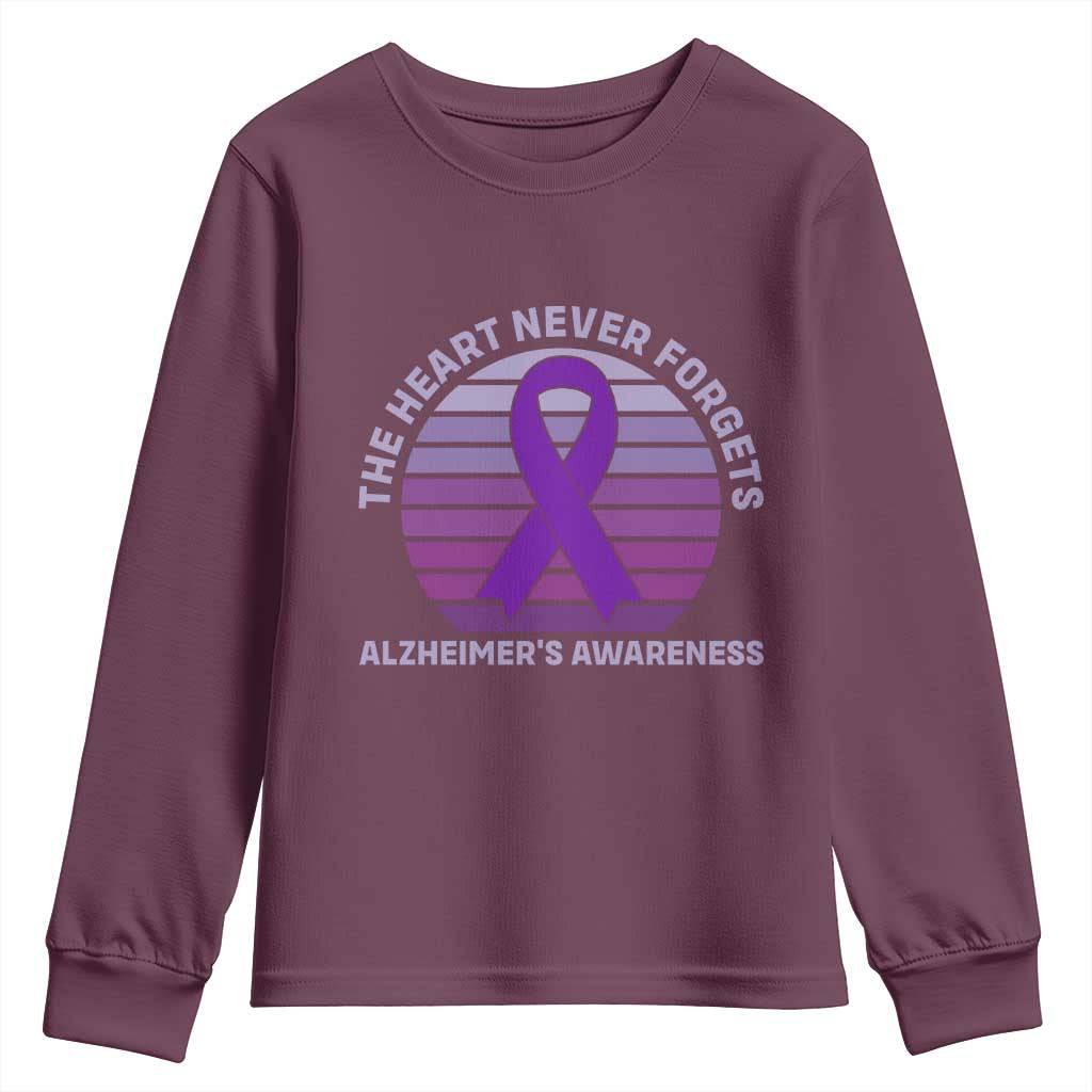 The Heart Never Forgets Alzheimers Support Youth Sweatshirt Vintage Sunset Purple Ribbon Graphic