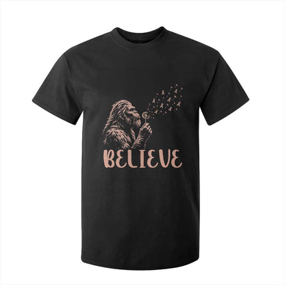 Funny Bigfoot Blowing Dandelion Flower Graphic T Shirt For Kid Believe Endometrial Cancer