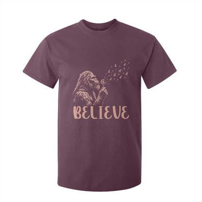 Funny Bigfoot Blowing Dandelion Flower Graphic T Shirt For Kid Believe Endometrial Cancer