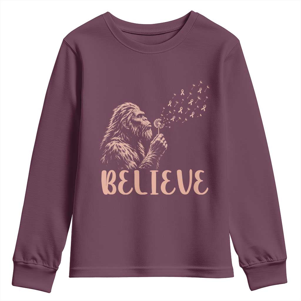 Funny Bigfoot Blowing Dandelion Flower Graphic Youth Sweatshirt Believe Endometrial Cancer