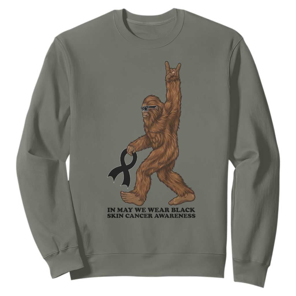 Funny Bigfoot Skin Cancer Support Sweatshirt In May We Wear Black